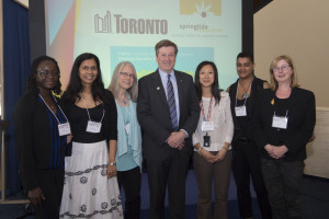 Jephtee Elysee (City of Ottawa), Kara Santokie (TWCA), Suzanne Doerge (CAWI), Mayor John Tory, Winnie Falkenstein (City of Toronto), Nadine Sookermany (Springtide), and Lois Emburg (City of Ottawa)